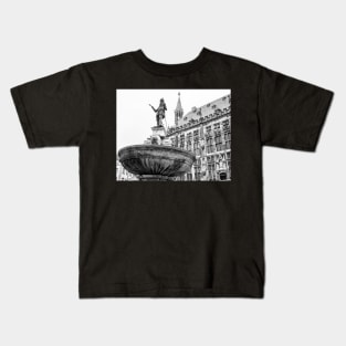 Religious statue with medieval church in the background Kids T-Shirt